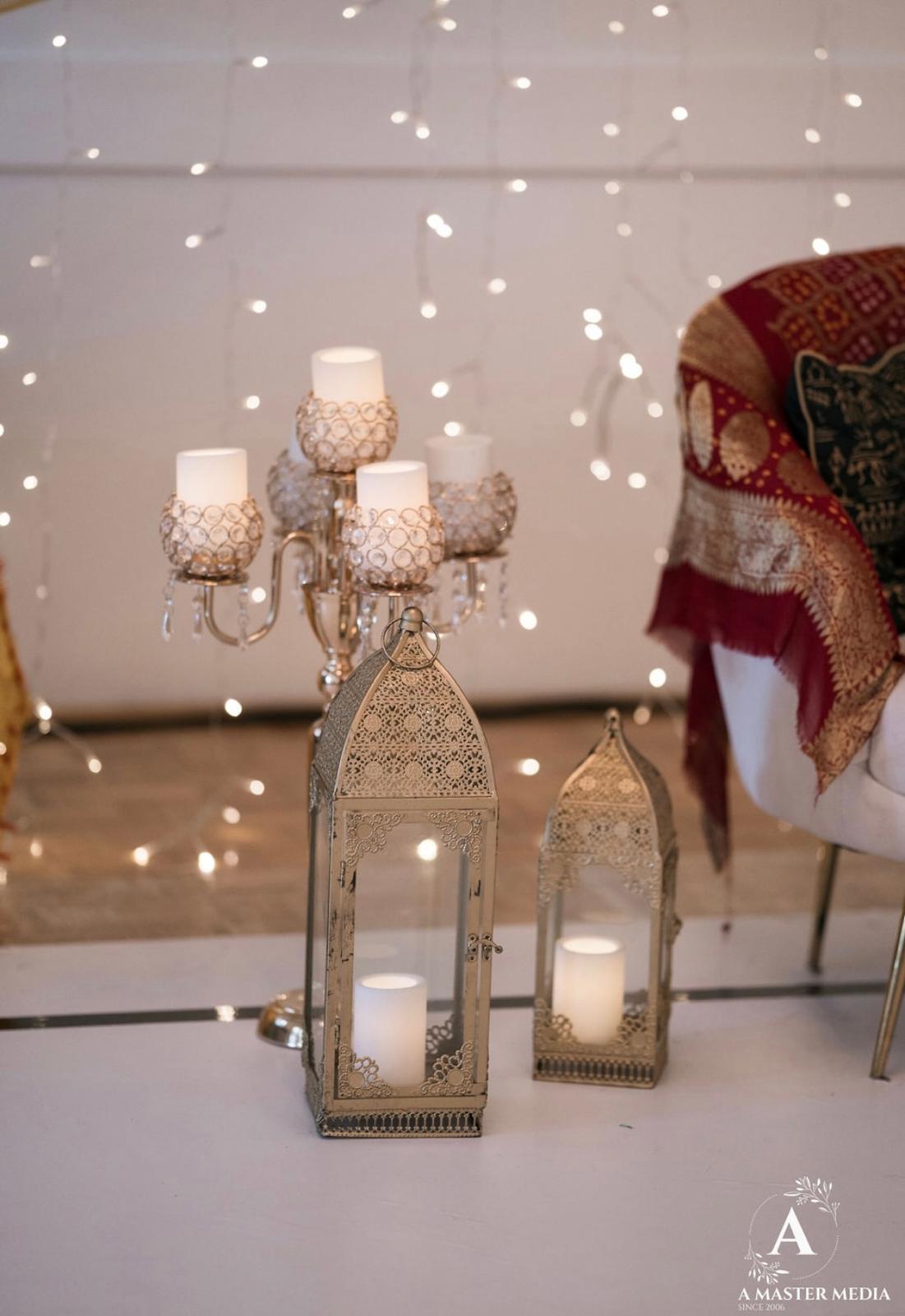 Lanterns with red sari and fairy lights