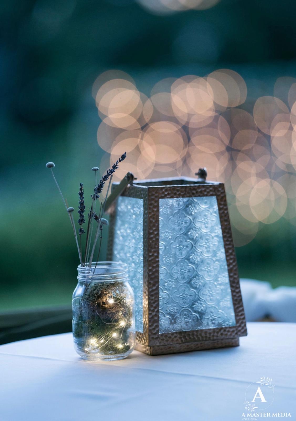 Mason jar with lavender and ornate lantern