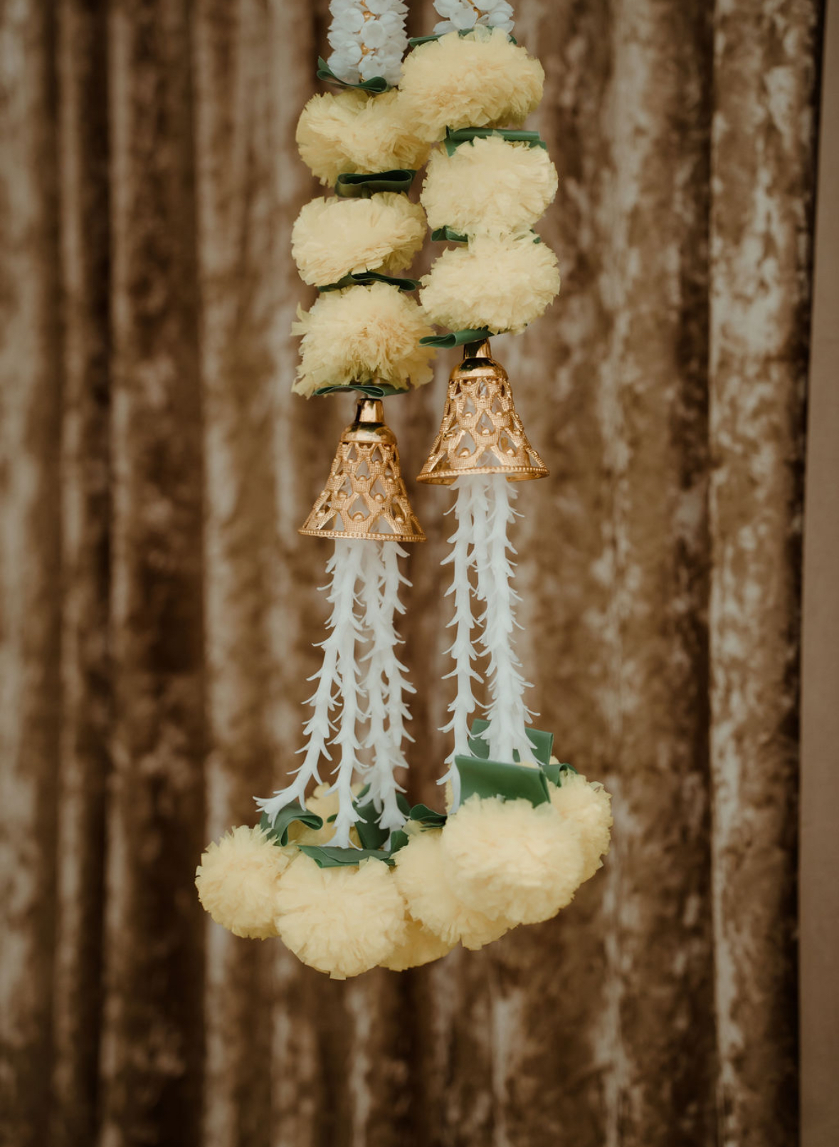 Yellow marigold tassels with golden bells