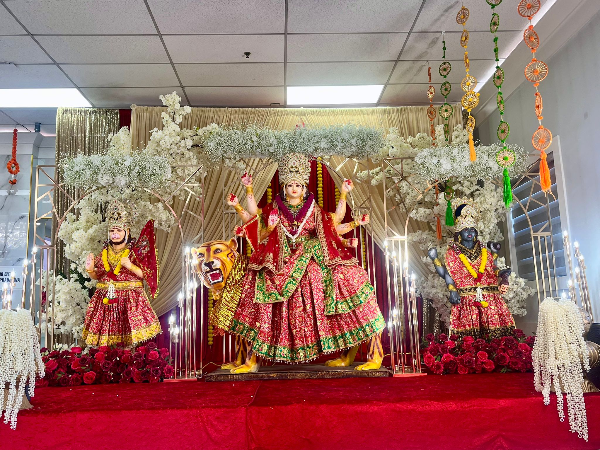 Devi flanked by Hanuman ji and Shri Krishna